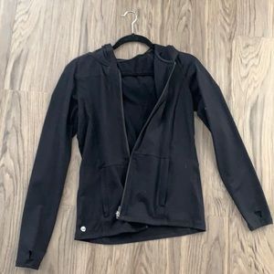 Senita Athletics black exercise zip up jacket.